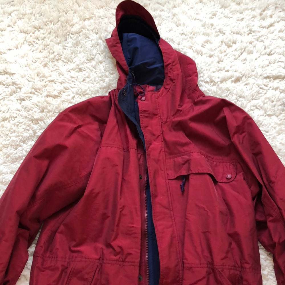 Super good quality never worn rain coat